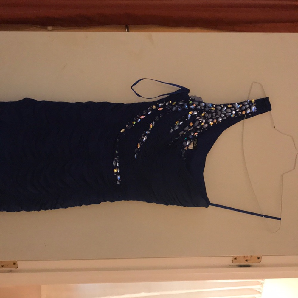 Blue dress one side trapless.  Worn one for semi